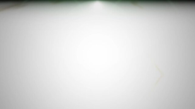 Six spotlights illuminate a clean white surface with subtle green accents in a cinematic sequence