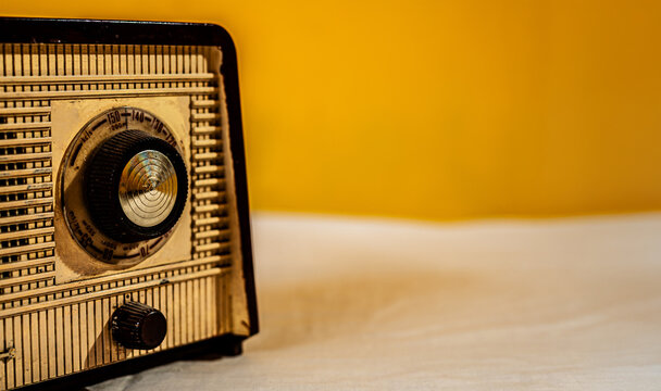 Vintage radio receiving broadcast with tuning dial detail
