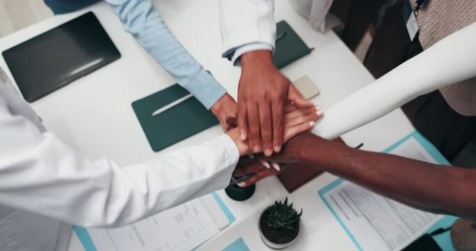 Medical, circle or people in clinic with handstack, achievement or motivation in hospital teamwork. Above, collaboration or doctor with hands together, success or encouragement in healthcare support.