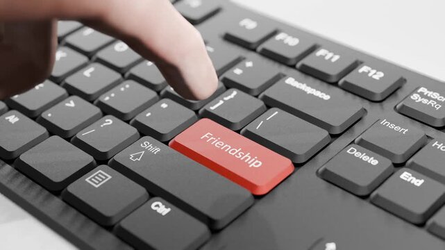 Hand About to Press Red "Friendship" Button on Black Keyboard, 3D Keyboard, Red Friendship Key Animation