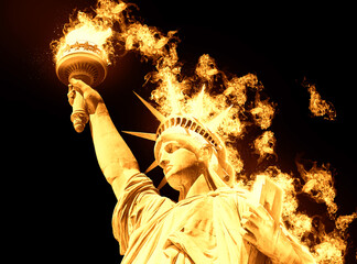  Statue of Liberty with burning fire isolated on black background © Maria