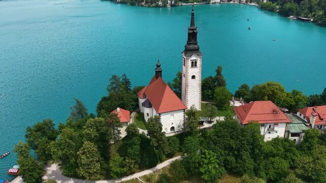 Drone Shot of Catholic Church on Island in Lake Bled, Slovenia on Sunny Summer Day