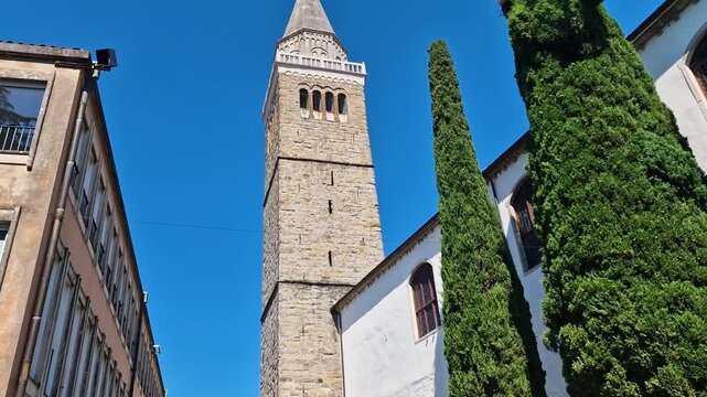 Koper, Slovenia. Cathedral Tower in Old Town on Sunny Summer Day, Street View