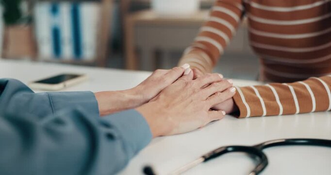 Medical, doctor or person in office with holding hands, comfort or empathy for healthcare results. Wellness, patient or gp in clinic with support, understanding or sympathy for evaluation diagnosis.