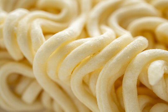 dry instant noodles texture background close up