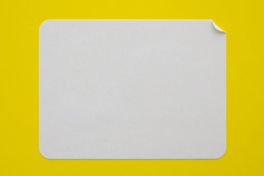 White crumpled sticker paper texture yellow background