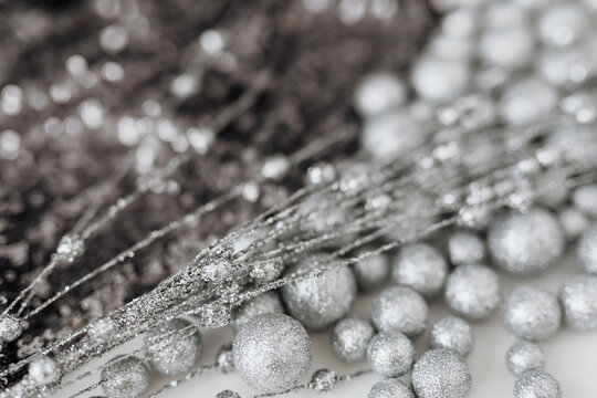 Glitter silver baubles and sequin textile