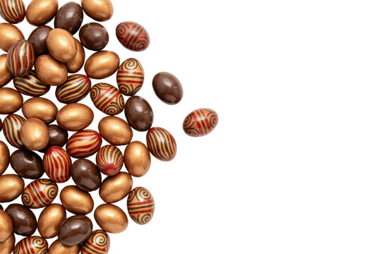 Assorted chocolate easter eggs with metallic gold and brown striped patterns on a white background, isolated on a, transparent background