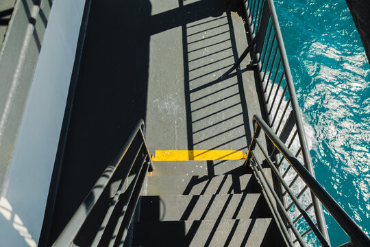 Ferry Staircase Above Sparkling Turquoise Sea