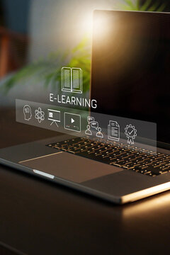 E learning concept with laptop and digital icons in a modern workspace