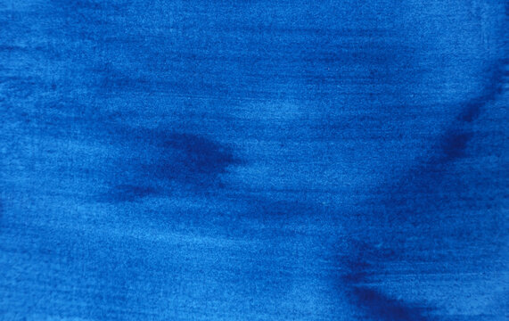 Abstract deep blue background. Delicate paint texture, visible brush strokes, subtle color transitions. Artistic backdrop, allusion to water, the sea. Hand drawn.