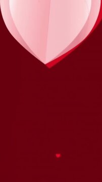 Animation of pink heart icons floating against copy space on red background