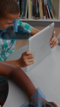 Animation of arrow in clouds over diverse children using digital tablet in school