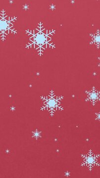 Animation of snowflakes falling on red background