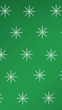 Animation of snowflakes falling on green background