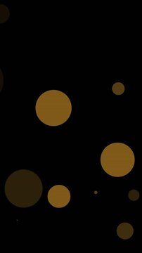 Animation of multiple yellow spots floating on black background