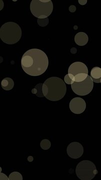 Animation of light spots falling on black background