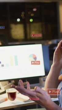 Talking on phone, businesswoman with animation of digital media icons in office