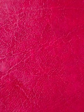 Raspberry abstract background with rich vibrant pink and red texture
