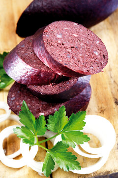 Sliced blood sausage with onions