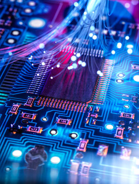 Glowing fiber optic cables on a futuristic computer microchip