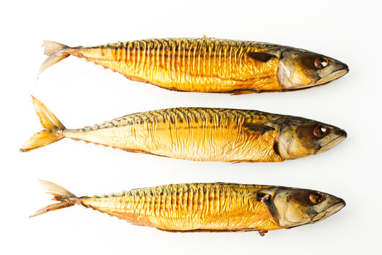 Smoked mackerel on white background, close up