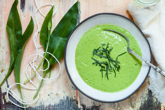 Bowl of ramson soup garnished with ramson