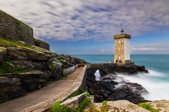 Phare de Kermorvan lighthouse on rocky coast in Brittany France