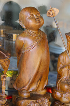 Little monk wood carving novice Buddha statue, hand carved wooden young Buddhist figurine for lucky feng shui asian home decor, Vietnam