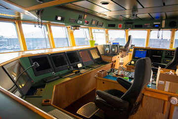 Interior of a commercial fishing vessel wheelhouse and navigation bridge © avphotographe