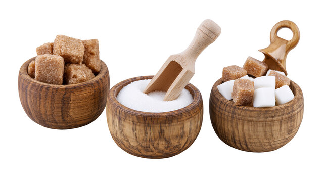 Brown and white sugar cubes and granulated sugar in small wooden bowls with scoop