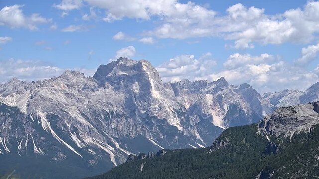 Iconic, dreamlike Dolomites. The Tofane and the Five Towers in summer. From hiking to climbing.