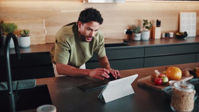 Happy man, tablet and typing in home for remote work, notes or article with editing and productivity. Freelancer, tech and writing for email feedback, proofreading and workflow for creative report