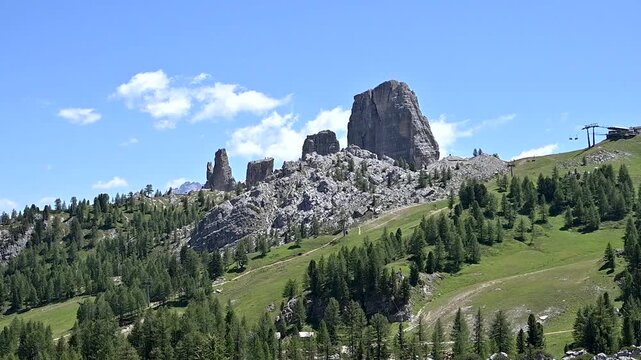 Iconic, dreamlike Dolomites. The Tofane and the Five Towers in summer. From hiking to climbing.