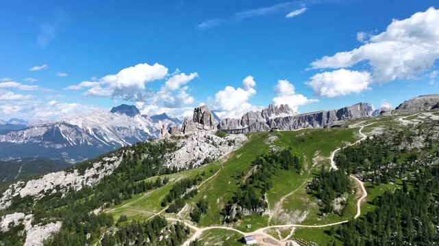 Iconic, dreamlike Dolomites. The Tofane and the Five Towers in summer. From hiking to climbing.