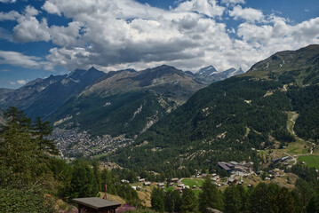 Fototapeta premium Zermatt with peaks above from Hermetji on hiking trail between Zermatt and Schwarzersee in Pennine Alps in Switzerland