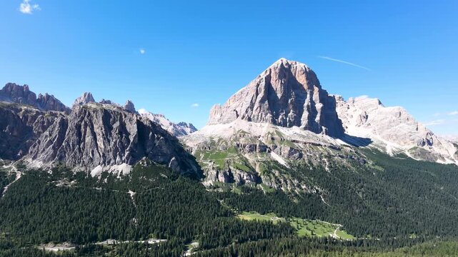 Iconic, dreamlike Dolomites. The Tofane and the Five Towers in summer. From hiking to climbing.