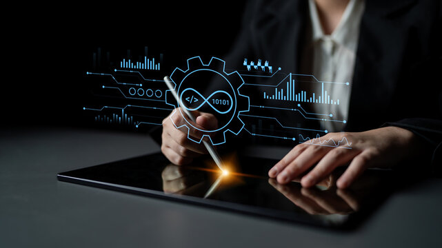 Professional using digital tablet with futuristic technology interface, data analysis and coding overlay, creative workspace concept. Entropy.