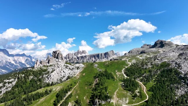 Iconic, dreamlike Dolomites. The Tofane and the Five Towers in summer. From hiking to climbing.
