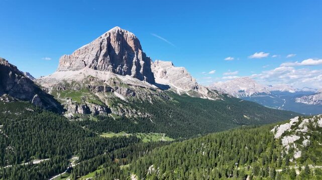 Iconic, dreamlike Dolomites. The Tofane and the Five Towers in summer. From hiking to climbing.