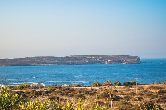 Beautiful landscape with the blue Mediterranean Sea and Comino Island on the horizon, Cirkewwa MALTA