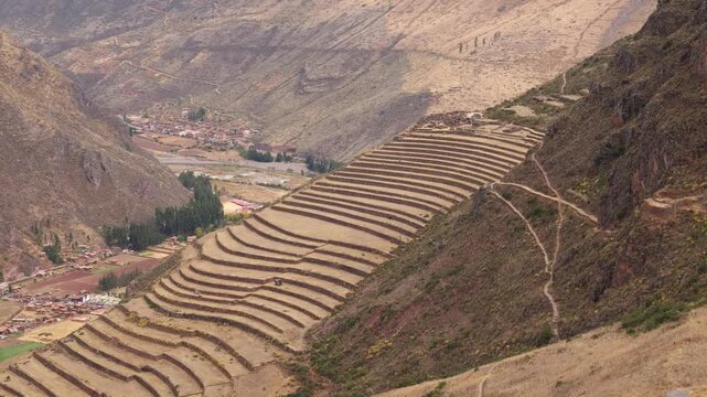 Inca terraces in the town of Pisac. Grass-covered mountain terraces.