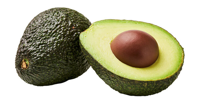 Whole and halved ripe avocado with large brown seed