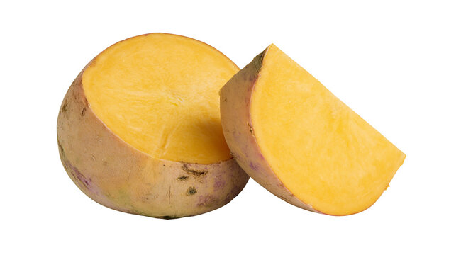 Fresh raw swede turnip cut into two pieces showing yellow flesh and brown skin