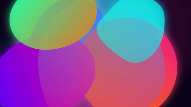 Abstract overlapping colorful circles fading and moving smoothly on dark background