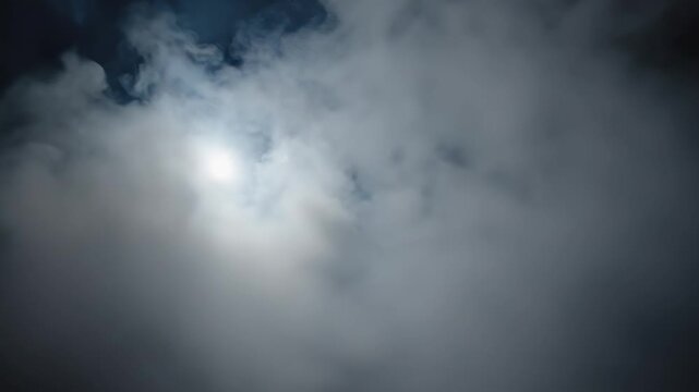 Dramatic sun rays piercing through dense moody clouds during a cinematic dawn sky reveal