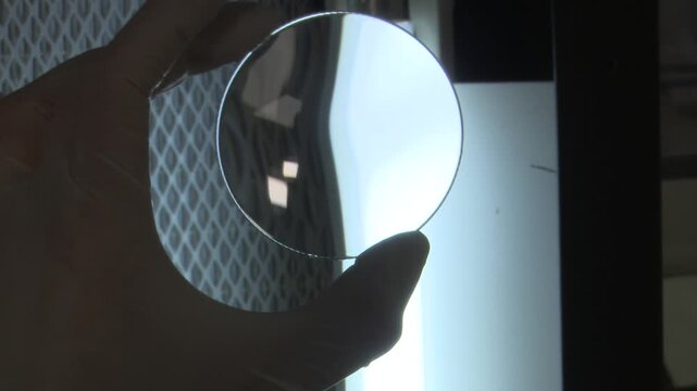 Ophthalmic lens coating process in manufacturing laboratory
