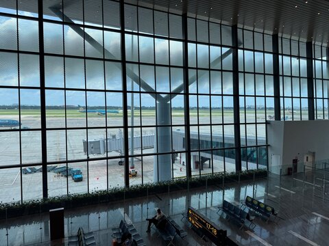 Modern departure gate and tarmac view at Tan Son Nhat International Airport in Ho Chi Minh City - October 6 2025