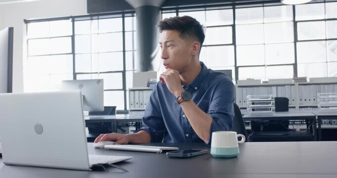 Lifestyle videos indoor of people doing activities at office, typing on keyboard, man working in mod