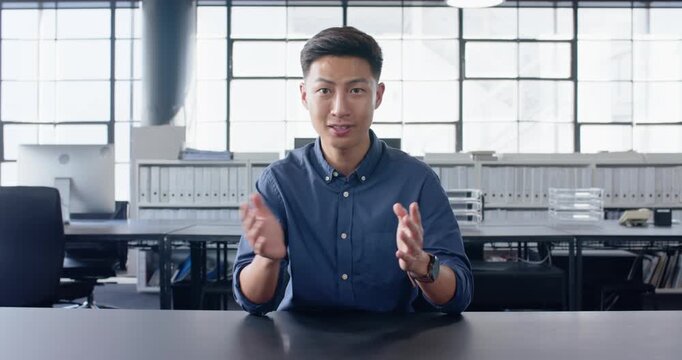 Close up of people talking to the camera, businessman sitting at desk in office, explaining
